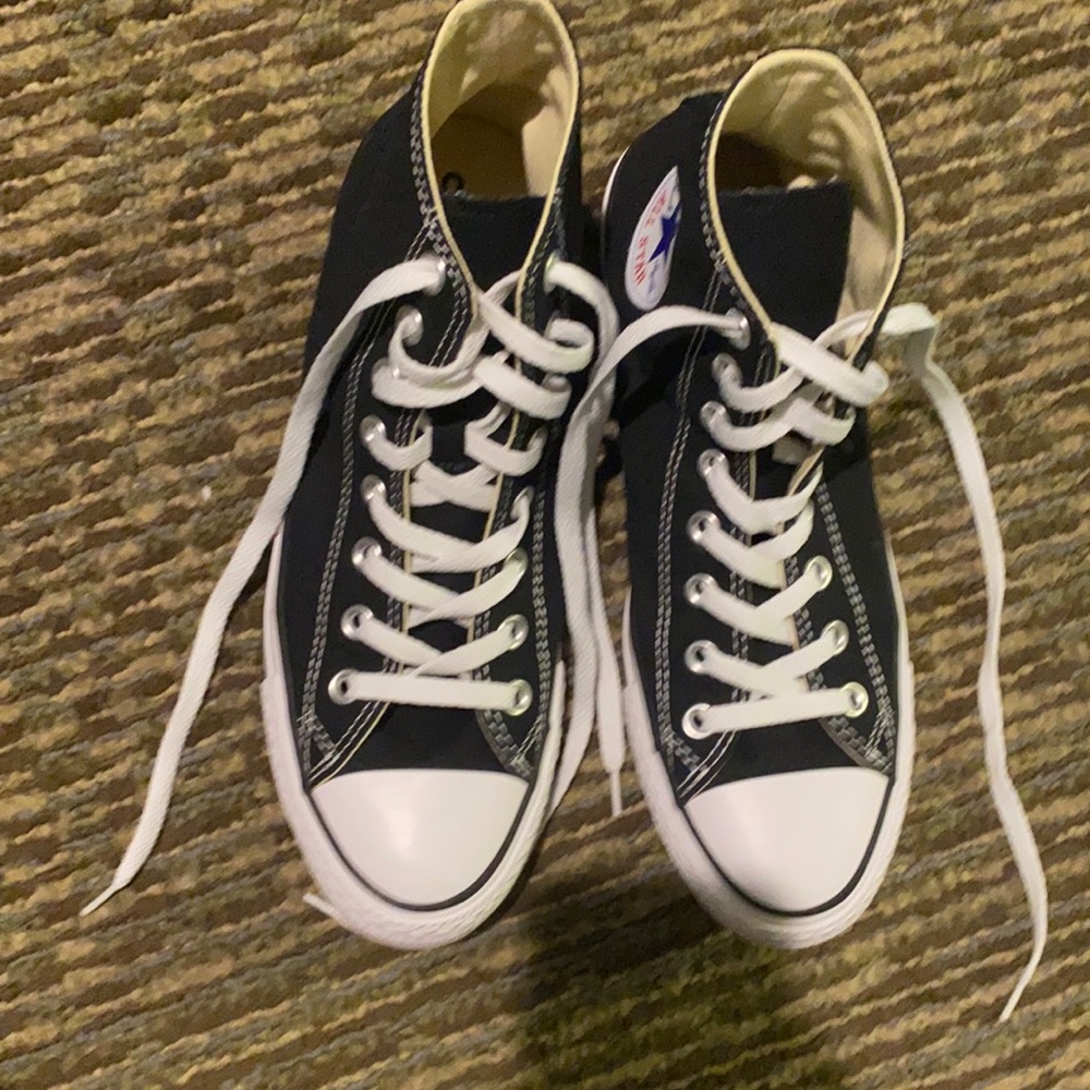 Black high top Chuck Taylor allstar converse shoes